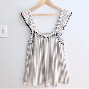 LOFT Ruffle straps with tassels.